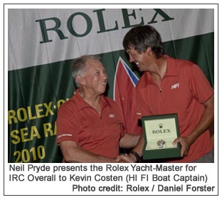 Neil Pryde presents the Rolex Yacht-Master for IRC Overall to Kevin Costen (HI FI Boat Captain, Photo credit: Rolex / Daniel Forster