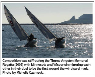 Competition was stiff during the Timme Angsten Memorial Regatta (2009) with Minnesota and Wisconsin mirroring each other in their duel to be the first around the windward mark. Photo by Michelle Czarnecki.