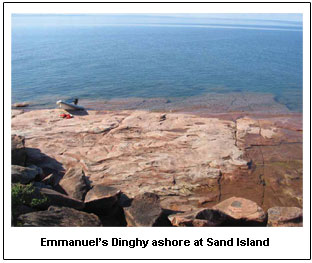 Emmanuel’s Dinghy ashore at Sand Island