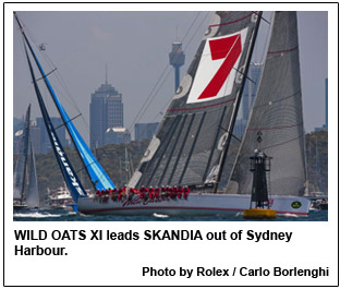 WILD OATS XI leads SKANDIA out of Sydney Harbour.