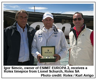 Igor Simcic, owner of ESIMIT EUROPA 2, receives a Rolex timepice from Lionel Schurch, Rolex SA, Photo credit: Rolex / Kurt Arrigo