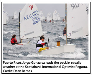 Puerto Ricos Jorge Gonzalez leads the pack in squally weather at the Scotiabank International Optimist Regatta.
Credit: Dean Barnes