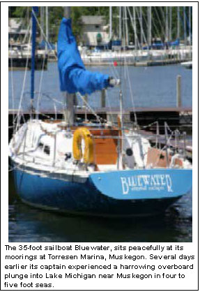 The 35-foot sailboat Bluewater, sits peacefully at its moorings at Torresen Marina, Muskegon. Several days earlier its captain experienced a harrowing overboard plunge into Lake Michigan near Muskegon in four to five foot seas.