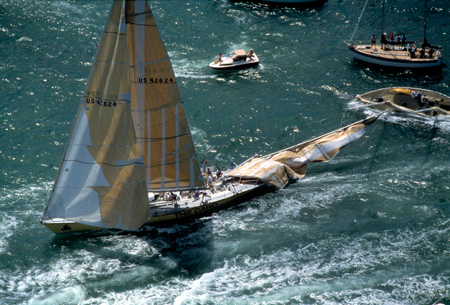 The Card, dismasted and tangled with the spectator boat at the re-start of leg 4 in Auckland, Whitbread Round the World Race 1989-90. Photo: David Branigan / PPL