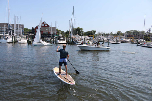 Using a stand up paddleboard in a congested harbor requires an increased focus on safety.