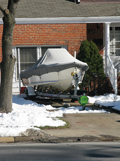 Storing your boat in the driveway for the winter saves money on the family boating budget, however, parking the trailer with the tongue facing the street makes it a tempting target for thieves.