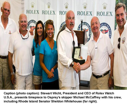 Stewart Wicht, President and CEO of Rolex Watch U.S.A., presents timepiece to Osprey's skipper Michael McCaffrey with his crew, including Rhode Island Senator Sheldon Whitehouse (far right).