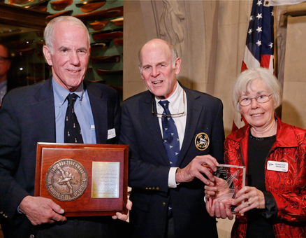 The Cruising Club of America Commodore Frederic T. Lhamon (center) presents the 2013 Far Horizons Award to Tom and Dorothy Wadlow for an admirable 18 years and 75,000 miles of cruising (Photo Credit CCA/Dan Nerney).