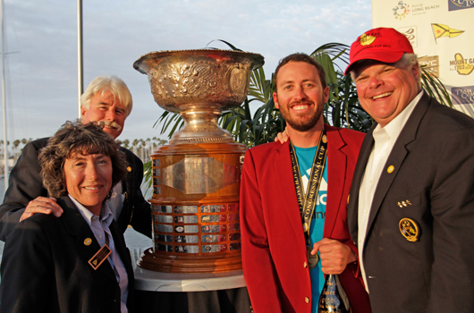 Taylor Canfield posing alongside the Congressional Cup © Photo BOB GRIESER