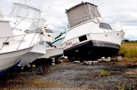 BoatUS says boat owners need to be vigilant about who they hire to salvage their boat and make repairs. These boats are located in Somers Point, NJ