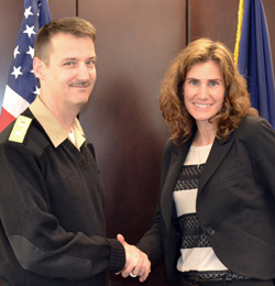 NOAA NOS AA Holly Bamford congratulates Rear Adm. Glang after swearing him in as commissioner of the Mississippi River Commission