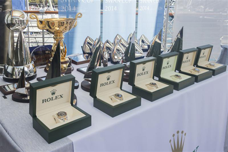 Rolex timepieces and trophies awarded to the winners of the Rolex Swan Cup 2014