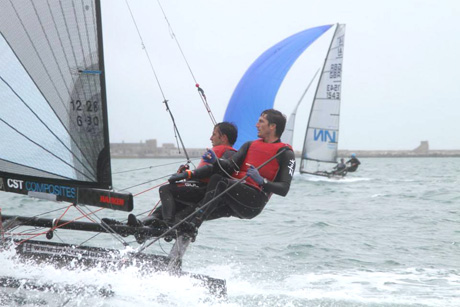 Archie Massey and Harvey Hillary competing in the Castle Cove Sailing Clubs Prince of Wales Cup Week in August 2014 up against Glen Truswell (1543). Credit: Caroline Litchfield