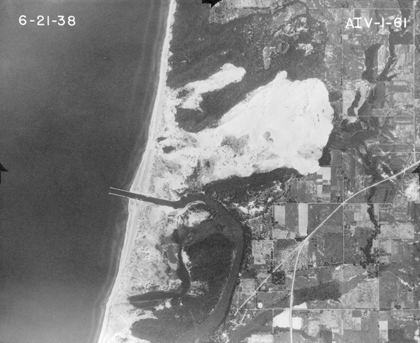 Singapore, Mich. was buried by sand in the 1870s after the area was deforested and the dunes shifted. This photo from 1938 shows the empty area where the ghost town lies.