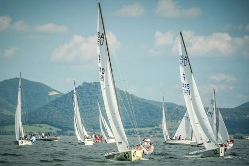 Jody Starck (bow) and Ian Jones (middle) crewed for David Starck to win the Lightning World Championship in Italy (#47) (Photo Credit: Gabriele Cinti / profotosport.com).