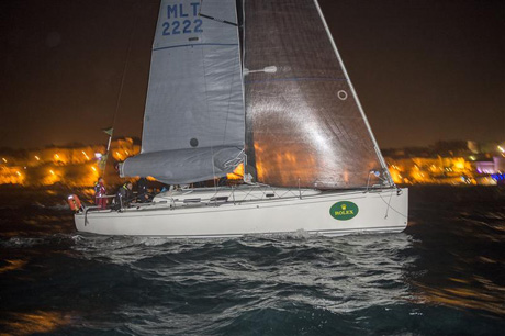 ARTIE (MLT) crossing the finish line in Marsamxett Harbour to become winner of the Rolex Middle Sea Race 2014