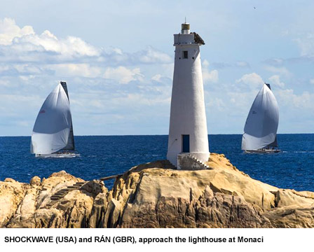 SHOCKWAVE (USA) and R�N (GBR), approach the lighthouse at Monaci