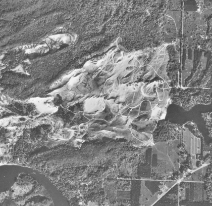 The tracks in 1974 are clearer than ever. The sand darkens over time as the beach grass grows in thicker.